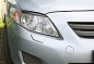 Накладки на передние фары (Реснички) Toyota Corolla седан 2007-2010